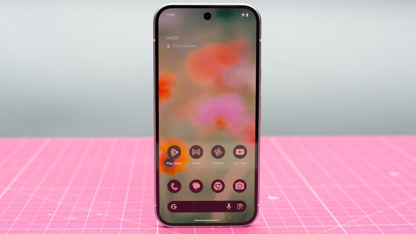 Google Pixel 9 in green Wintergreen color showing AI features on screen