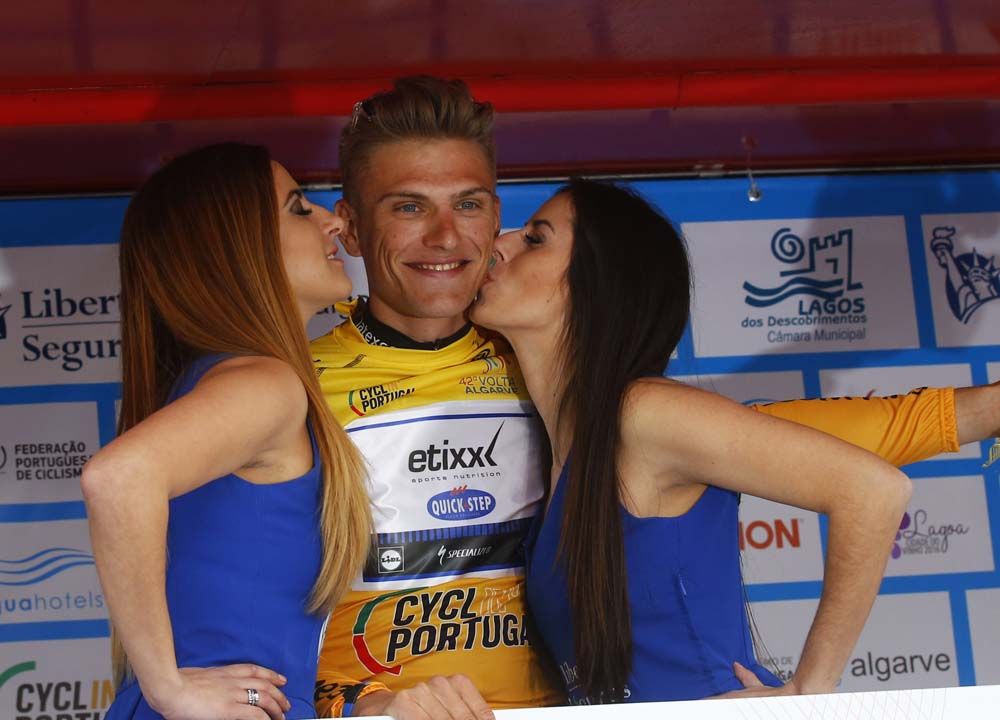 Marcel Kittel (Etixx-QuickStep) pulls on the first leader's jersey