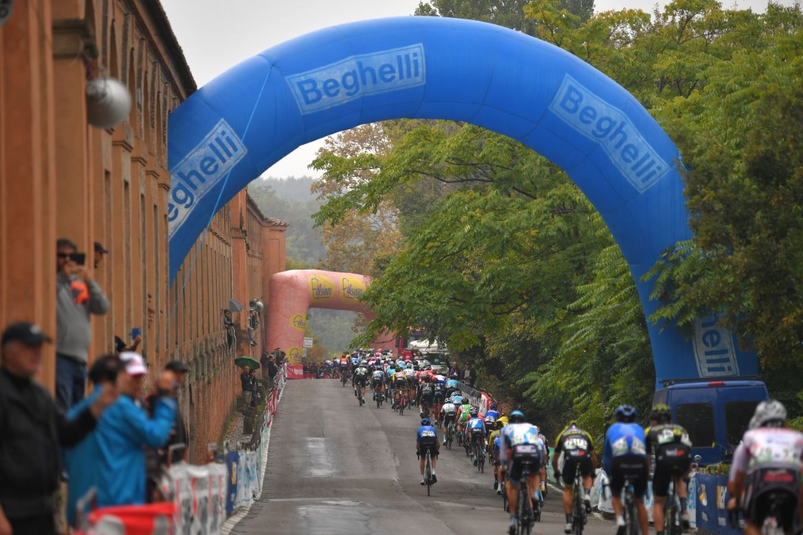 The riders approach the climb