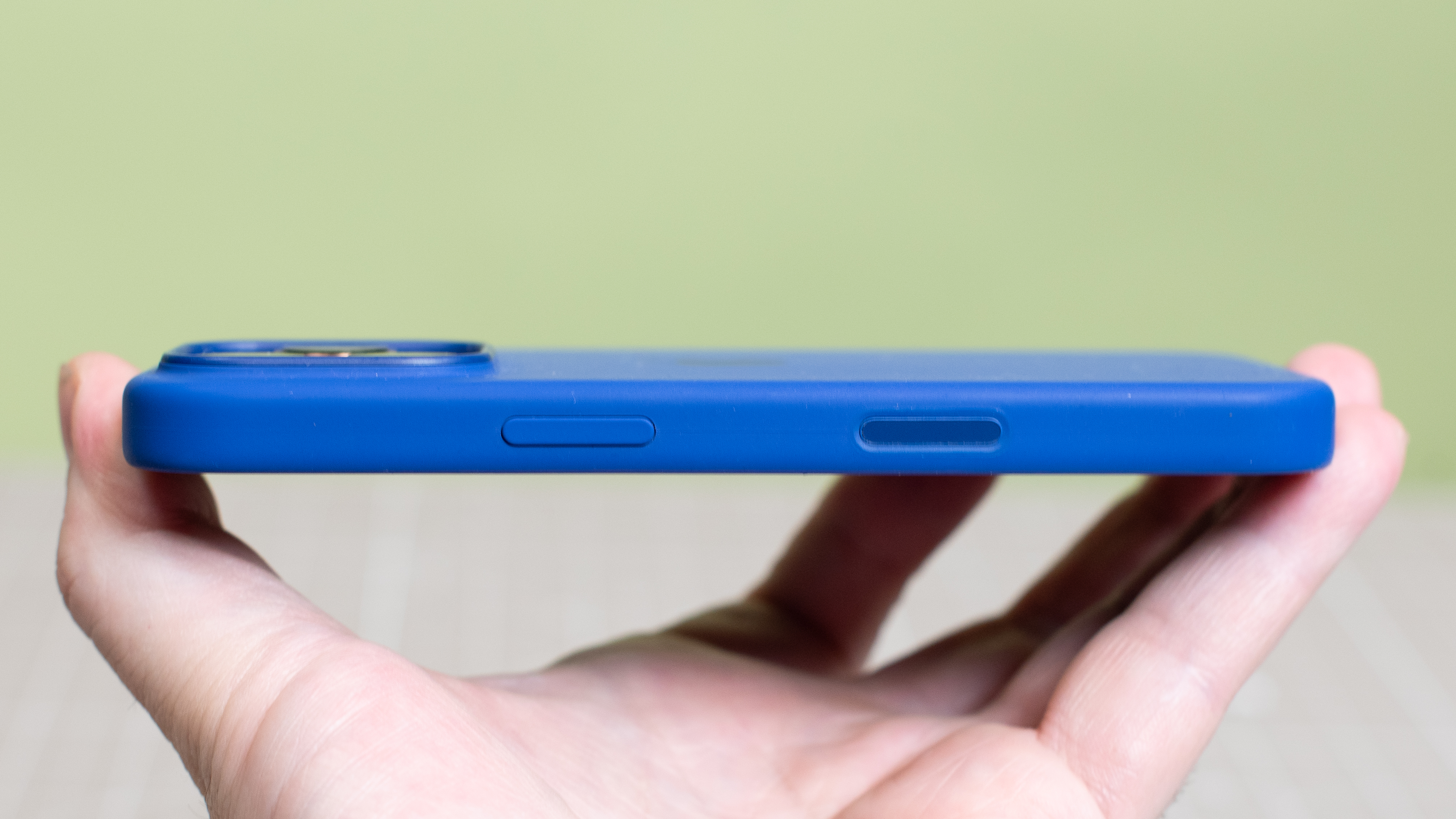 Apple iPhone 16 Pro Silicone Case with MagSafe from side showing sapphire camera control