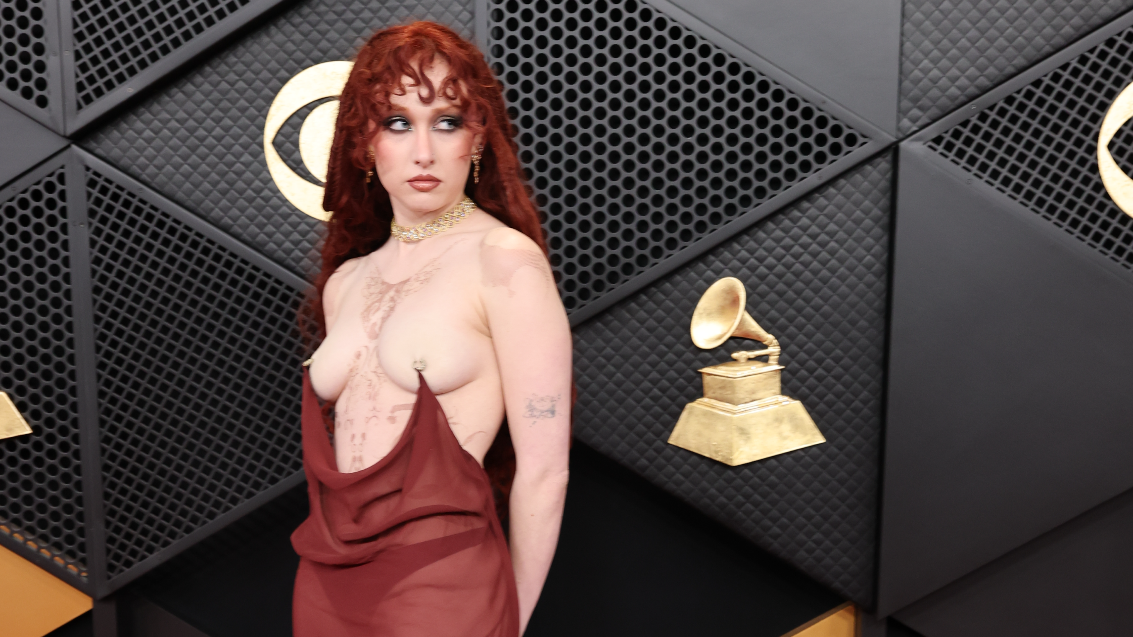 chappell roan in a red naked dress at the 2026 grammys red carpet