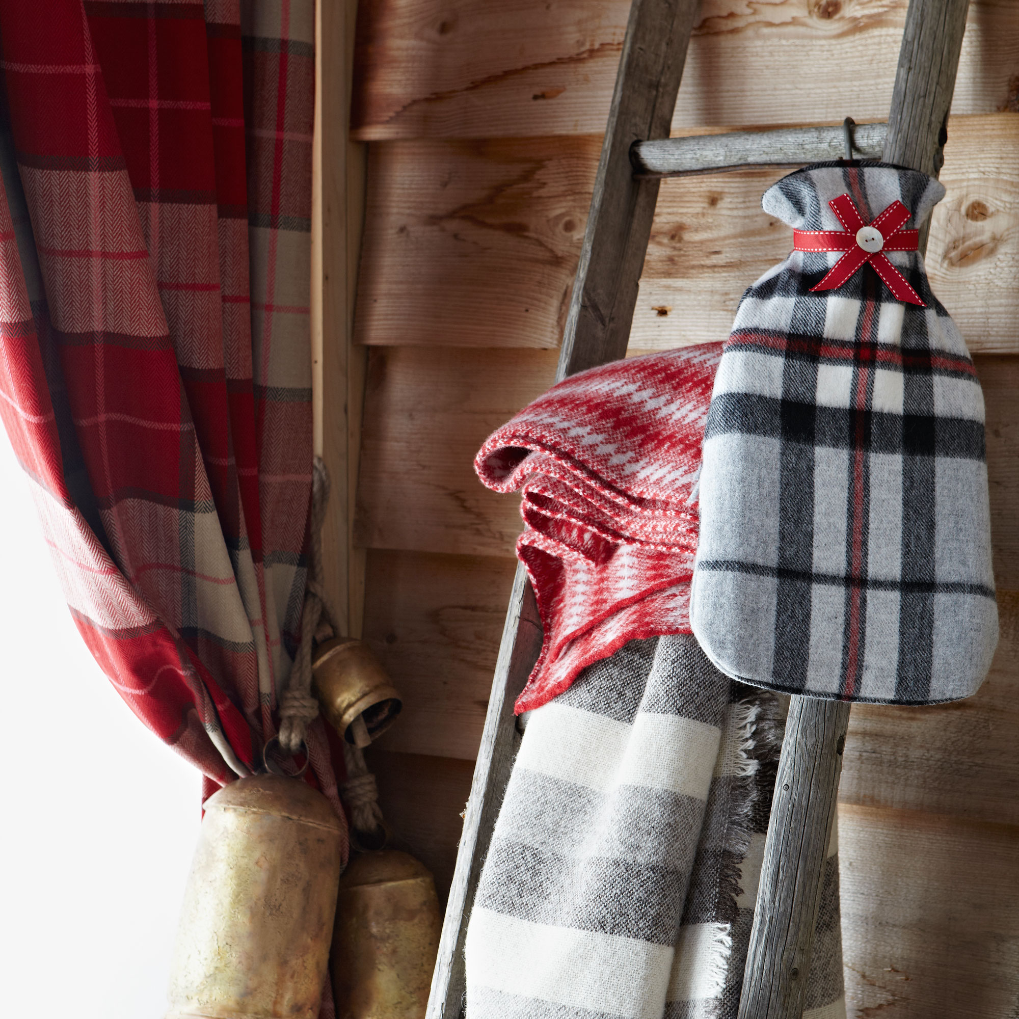 Cabin with felted and wool blankets and hot water bottle