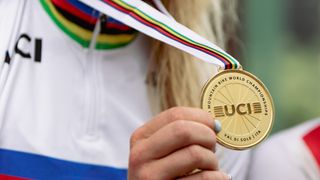 Close up of the UCI XC winners gold medal