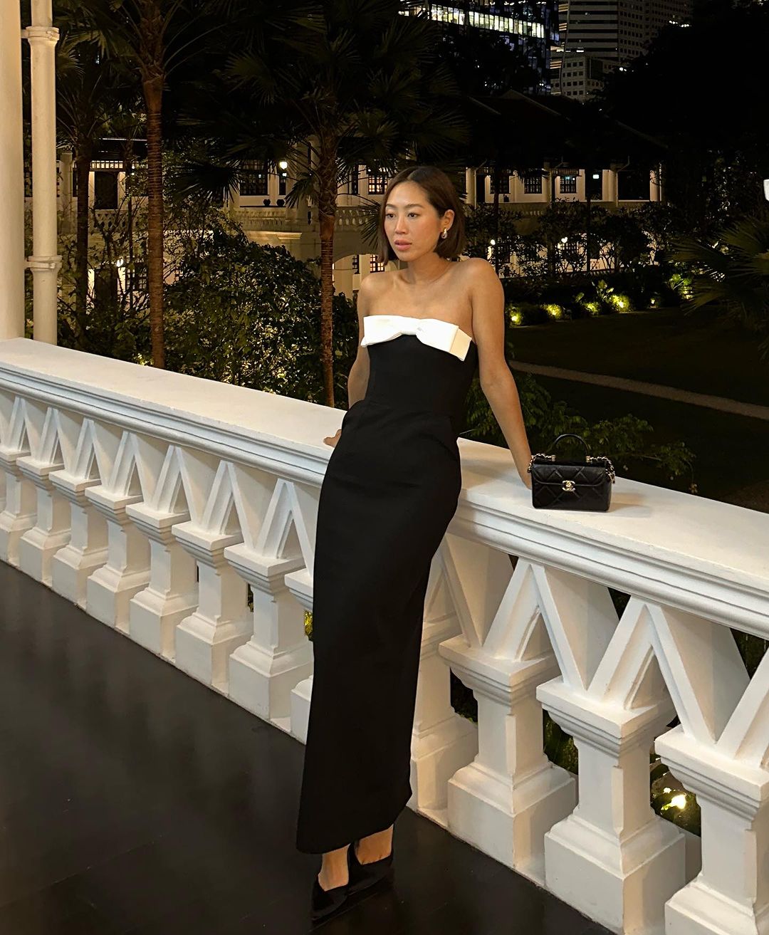 @aimeesong wearing a black and white gown