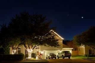 Skywatcher Ted Mauerer caught this extra bright Christmas lights display on Dec. 26, 2011, when Venus and the moon were shining bright together over his Texas neighborhood.