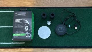 The Blast Golf Swing Analyser unboxed showing all contents