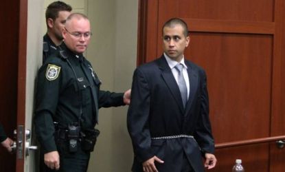 George Zimmerman is lead into a courtroom for his bond hearing on April 20 in Sanford, Fla. While Alan Dershowitz wants the murder charge dropped, other analysts think the truth has yet to be