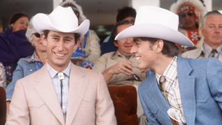 Prince Charles, Prince of Wales (L) and Prince Andrew, Duke of York dress as cowboys on March 1, 1977 at Calgary in Canada