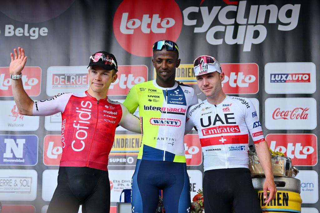 MONTDELENCLUS BELGIUM MAY 29 LR Axel Zingle of France and Team Cofidis on second place race winner Biniam Girmay of Eritrea and Team IntermarcheWanty and Marc Hirschi of Switzerland and UAE Team Emirates on third place pose on the podium ceremony after the 83rd Circuit FrancoBelge 2024 a 1906km one day race from Tournai to MontdelEnclus on May 29 2024 in MontdelEnclus Belgium Photo by Luc ClaessenGetty Images