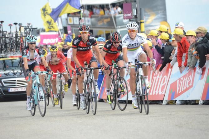 Steve Morabito and Philippe Gilbert lead home BMC teammate Cadel Evans on Stage 15 of the Tour de France