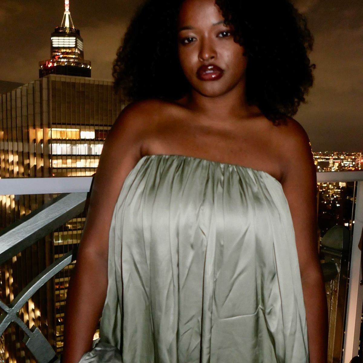 imani randolph wearing a strapless dress