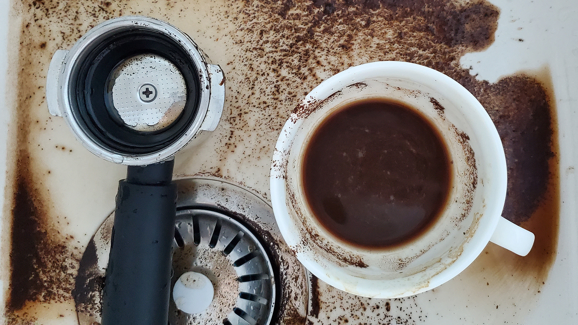 Coffee grounds poured in sink