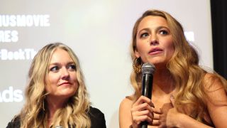 Hoover watching Lively talk after a screening of It Ends With Us