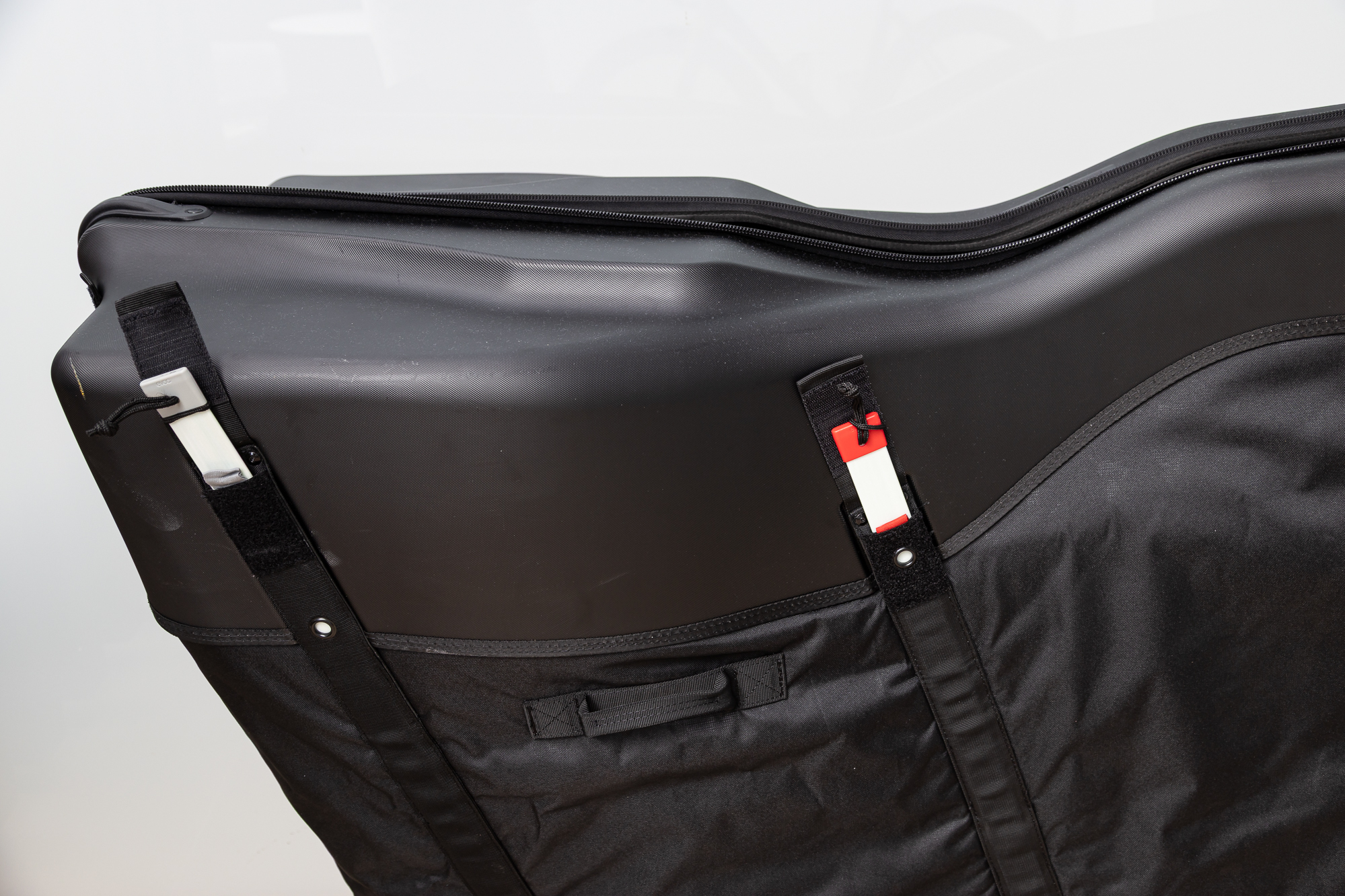 close up of a black bike bag showing the colour-coded struts