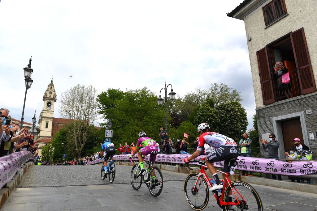 NOVARA ITALY MAY 09 Umberto Marengo of Italy and Bardiani CSF Faizan Pro Team Filippo Tagliani of Italy and Team Androni Giocattoli Sidermec Vincenzo Albanese of Italy and EOLOKOMETA Cycling Team on breakaway passing through Santena Village landscape during the 104th Giro dItalia 2021 Stage 2 a 179km stage from Stupinigi Nichelino to Novara Public Fans girodiitalia Giro UCIworldtour on May 09 2021 in Novara Italy Photo by Tim de WaeleGetty Images