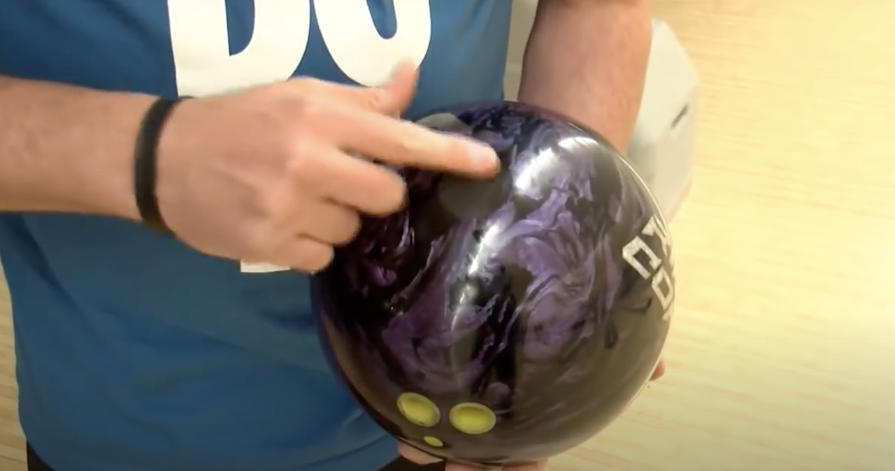 John Hinkle with the bowling ball containing his dad&amp;#039;s ashes.