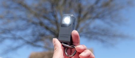 Pebblebee Halo held in the hand.