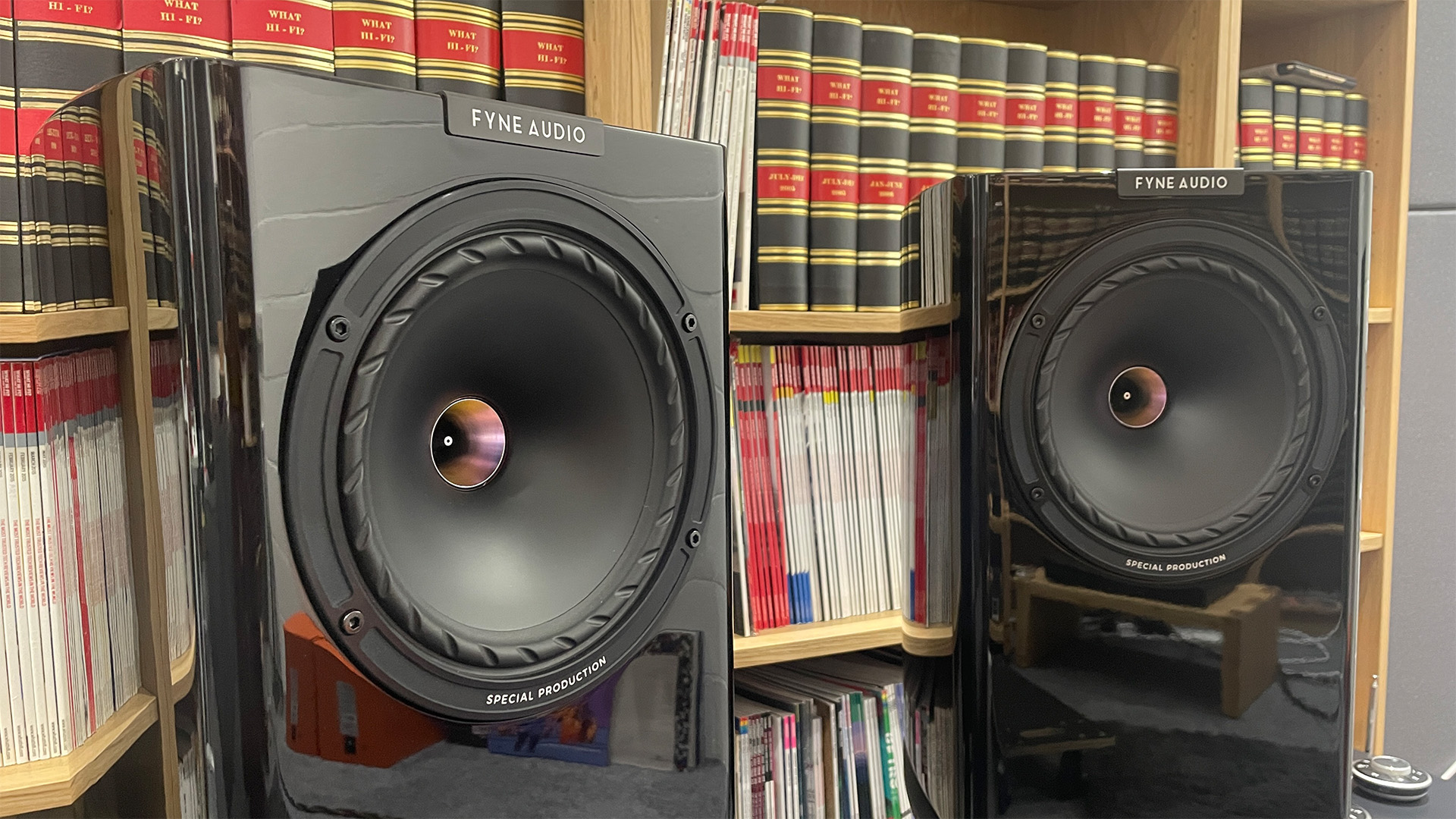Fyne Audio F701SP standmount speakers in front of bookcase