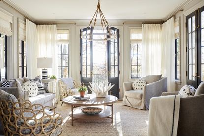sunroom ideas with rattan furniture and white linen sofa