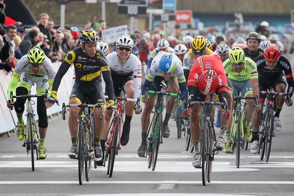 Jens Debusschere (Lotto Soudal) wins Dward door Vlaanderen by a bike throw over Bryan Coquard (Direct Energie)