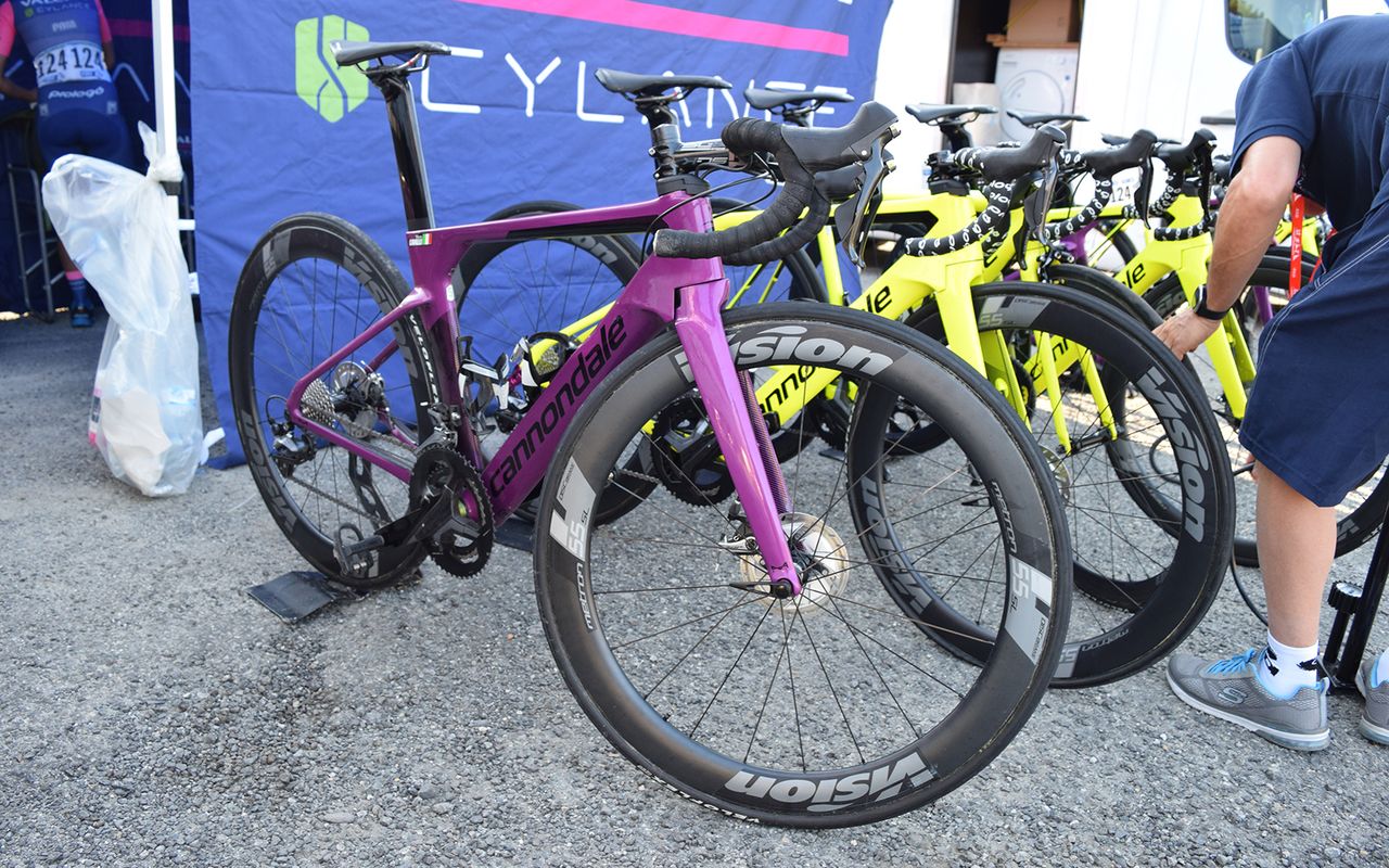 The Valcar Cylance riders have a mix of purple and fluoro yellow framesets
