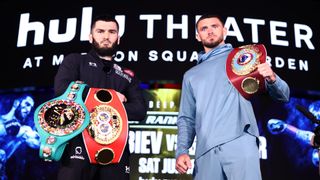 Artur Beterbiev (L) and Joe Smith Jr (R) pose during the press conference ahead of the WBC,IBF and WBO light heavyweight Championship fight, at The Hulu Theater at Madison Square Garden