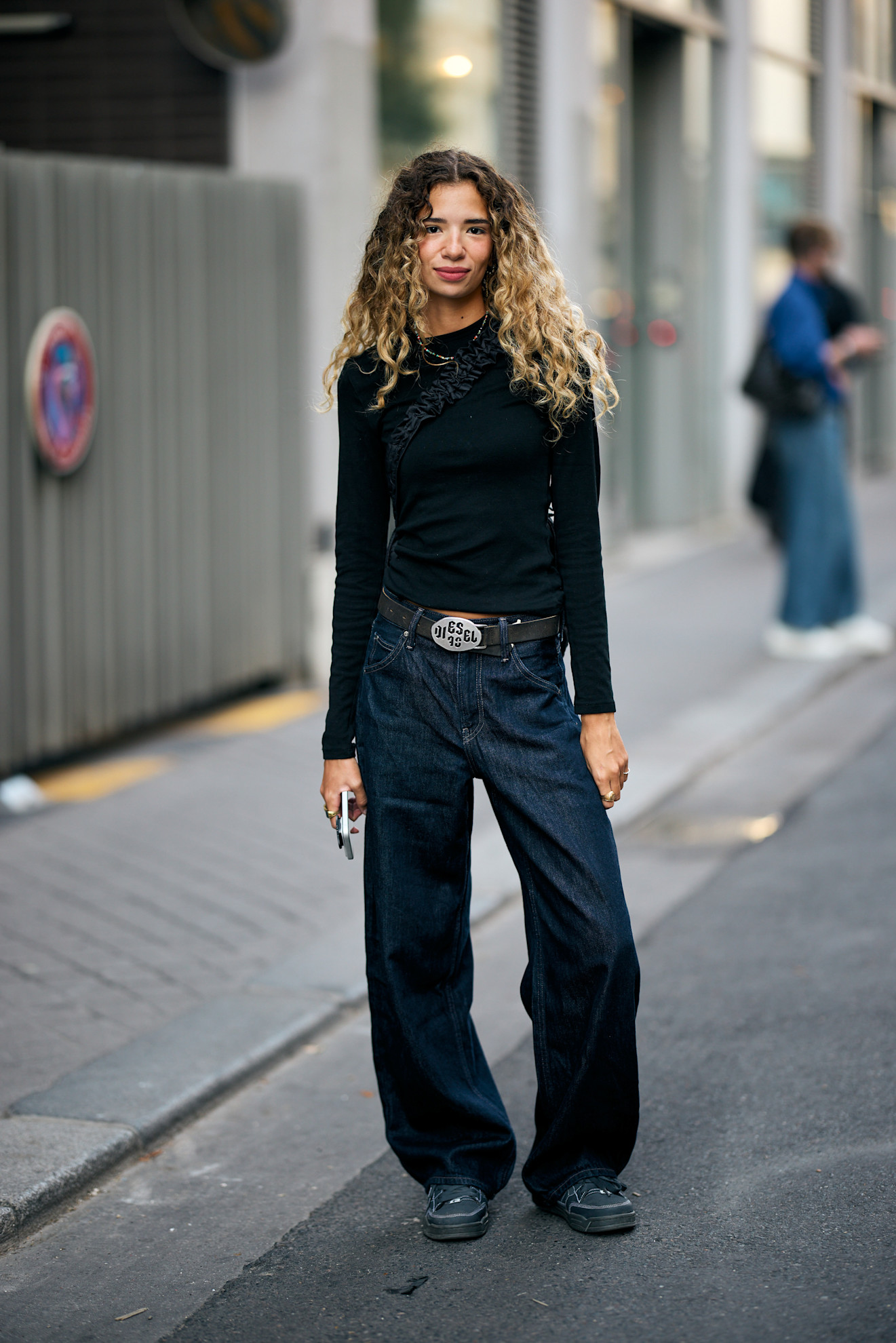 showgoer wearing French girl denim at Paris Fashion Week