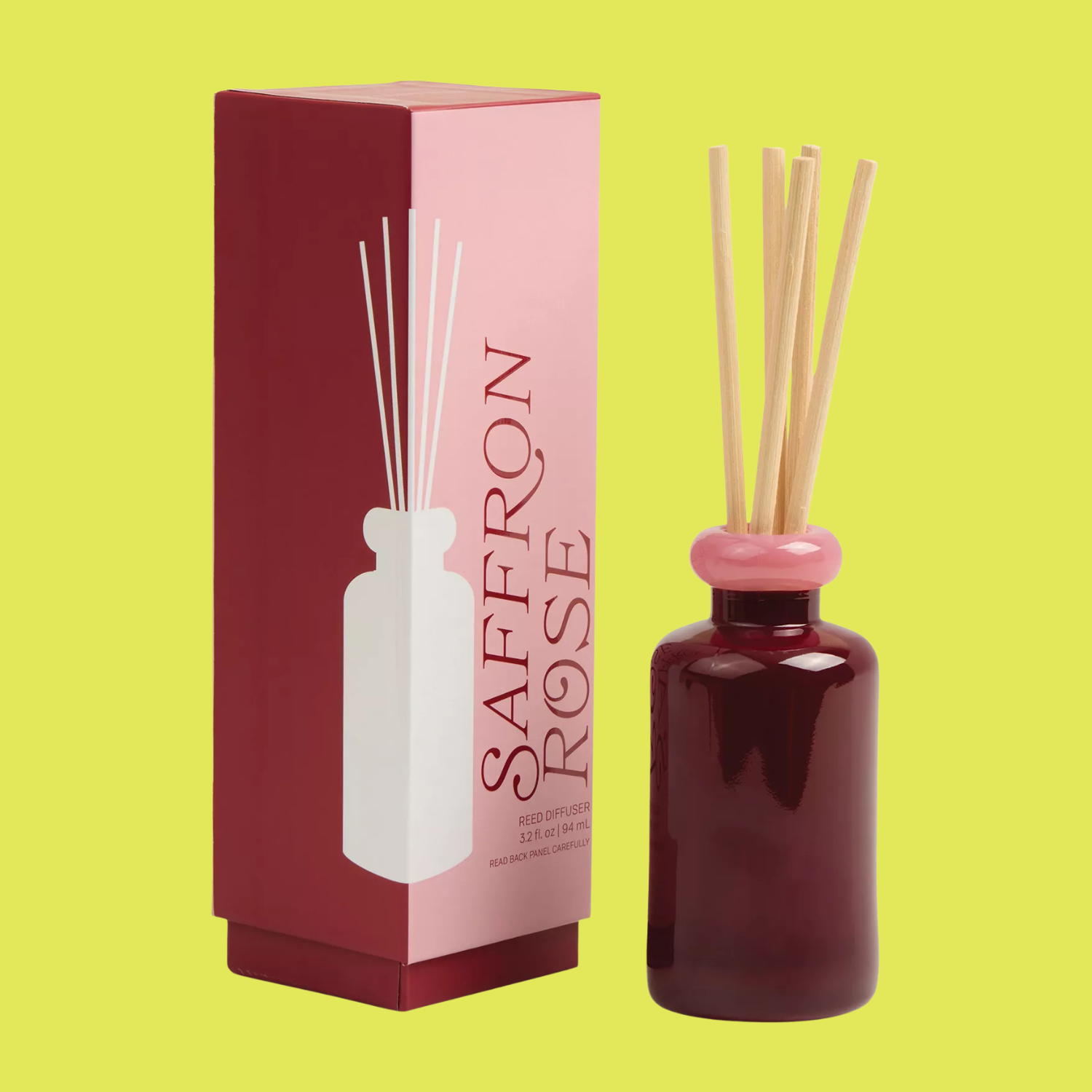 A red and pink glass reed diffuser