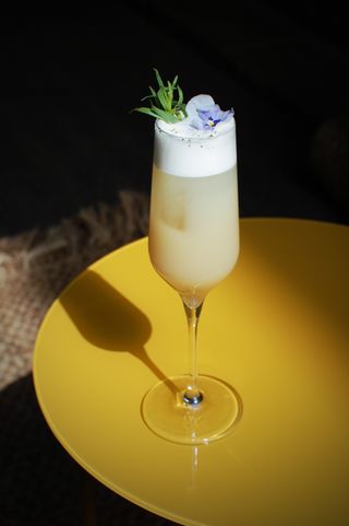 pale yellow cocktail on yellow table