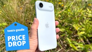 iphone air over grassy background with a price drop sticker