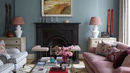  living room with blue walls and pink sofa in Edinburgh Georgian townhouse designed by Jessica Buckley