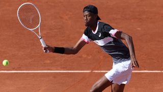 Christopher Eubanks plays a shot at the French Open