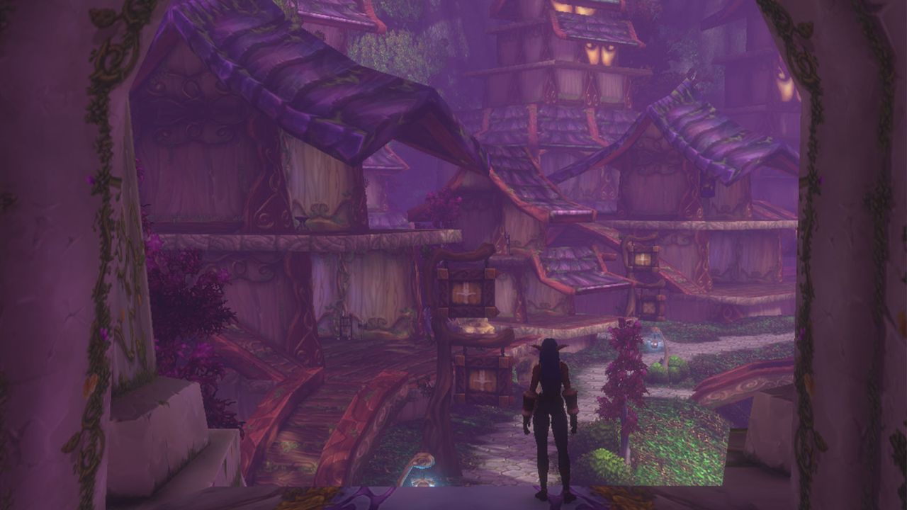 The player is silhouetted as they stand at the entrance of a dense urban environment