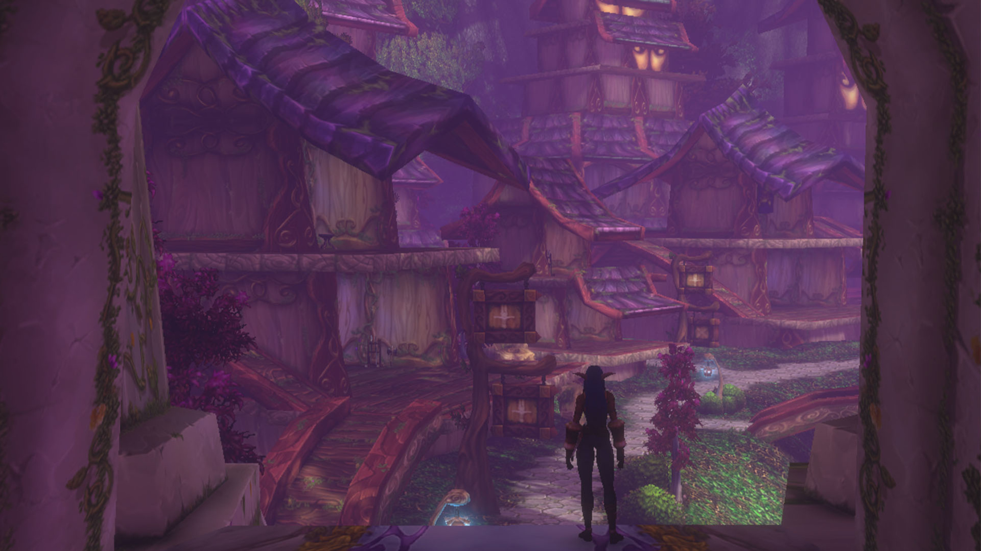 The player is silhouetted as they stand at the entrance of a dense urban environment