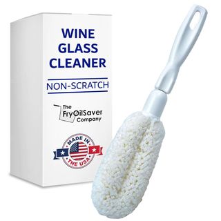 A long wine glass cleaning brush