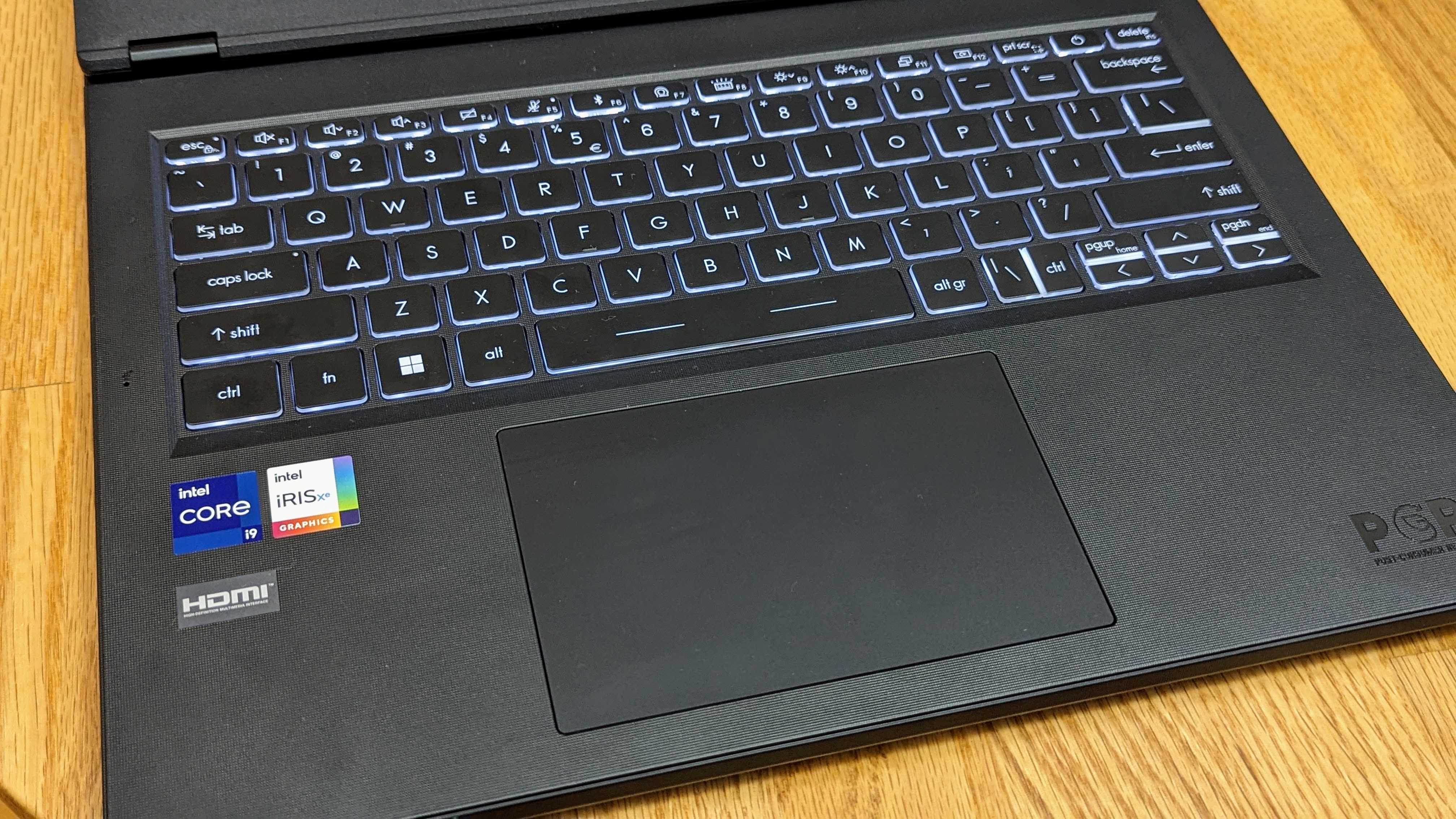 MSI Modern 14 H keyboard and trackpad showing the white key backlighting