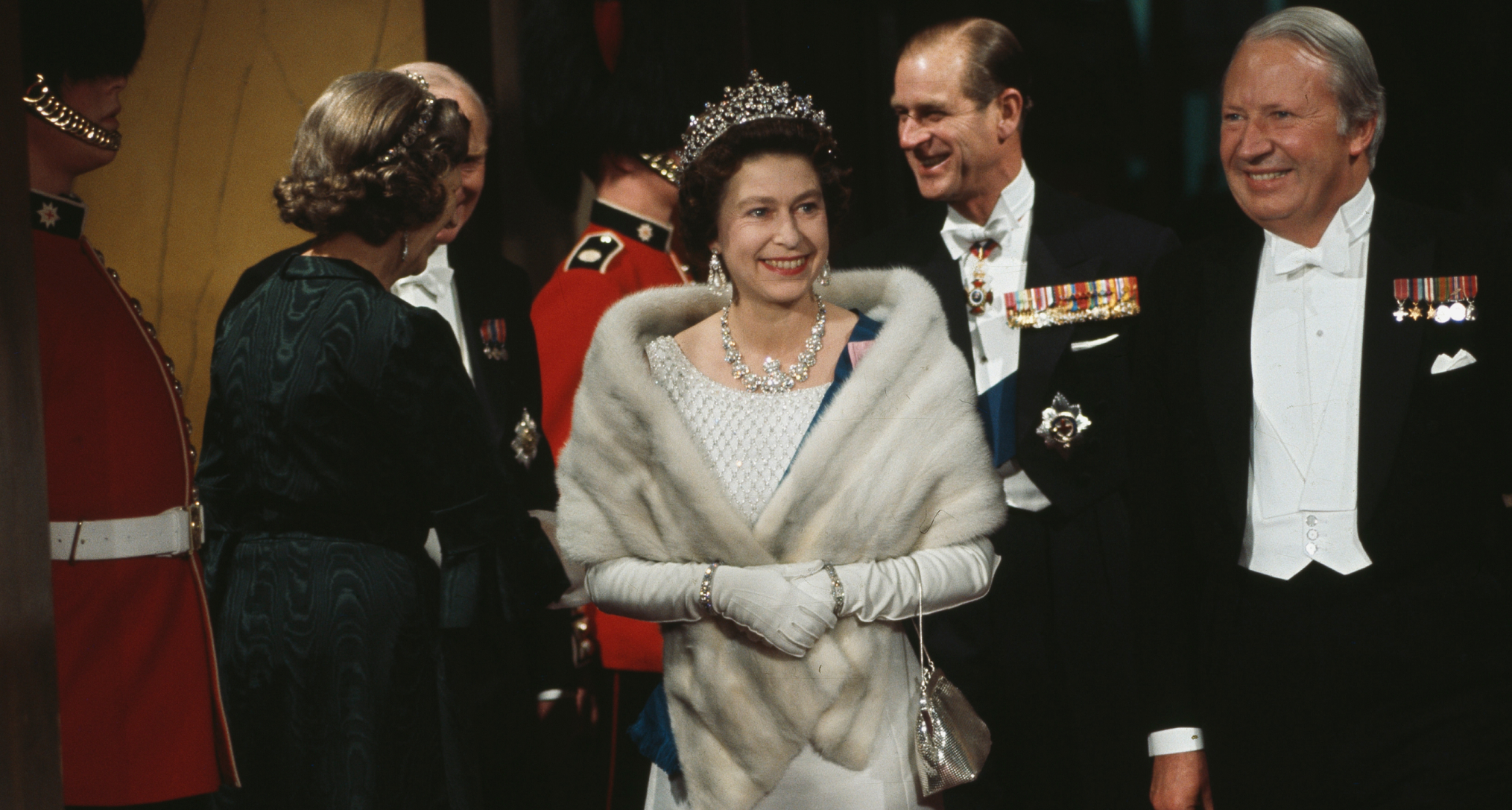 Queen Elizabeth wearing a tiara and fur stole
