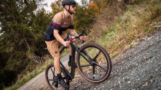 Man riding Rotwild R.R275 X Ultra e-gravel bike