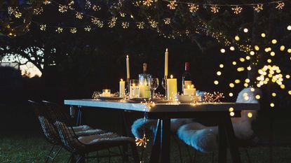 outdoor dinner party with backyard party lighting ideas from sparkle lighting