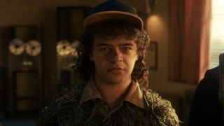Dustin looking teary eyed in Stranger Things.