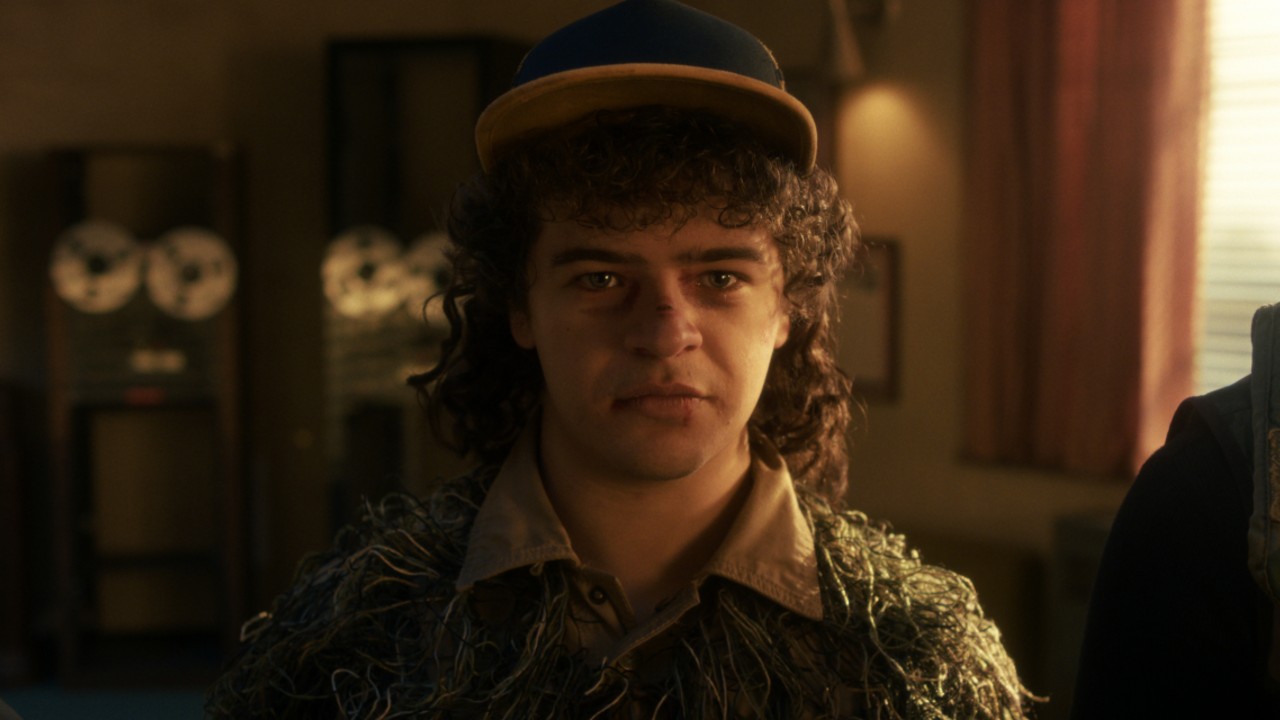 Dustin looking teary eyed in Stranger Things.