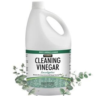 A side-on view of white bottle of Harris Cleaning Vinegar All Purpose Household Surface Cleaner