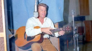 Glen Campbell records at the Capitol Records studios on June 1, 1967 in Los Angeles, California.