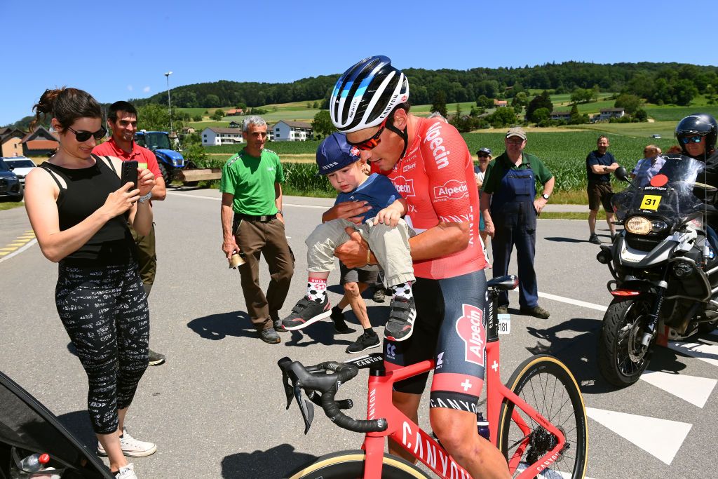 AESCH SWITZERLAND JUNE 13 Silvan Dillier of Switzerland and Team AlpecinFenix with his family Cornelia Dillier wife and son during the 85th Tour de Suisse 2022 Stage 2 a 198km stage from Kusnacht to Aesch ourdesuisse2022 WorldTour on June 13 2022 in Aesch Switzerland Photo by Tim de WaeleGetty Images
