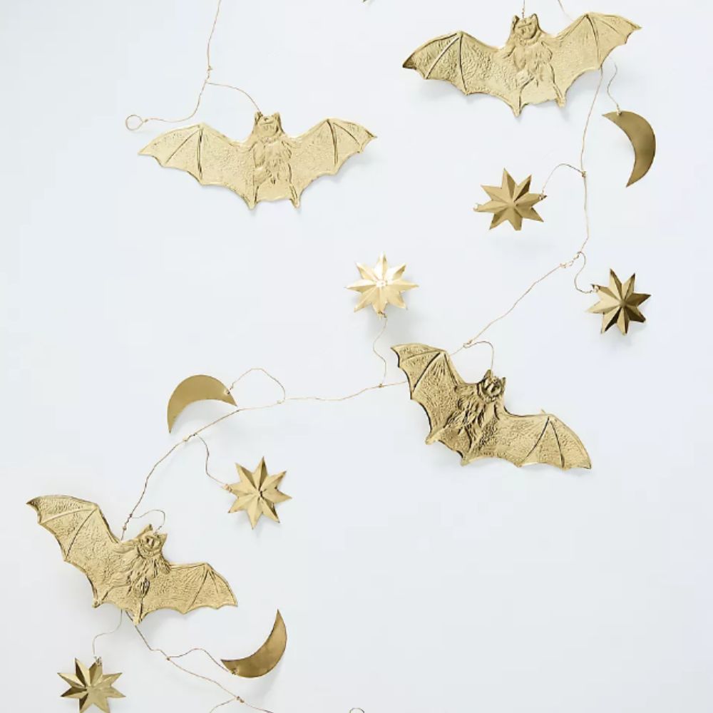 Gold metal bat and stars garland