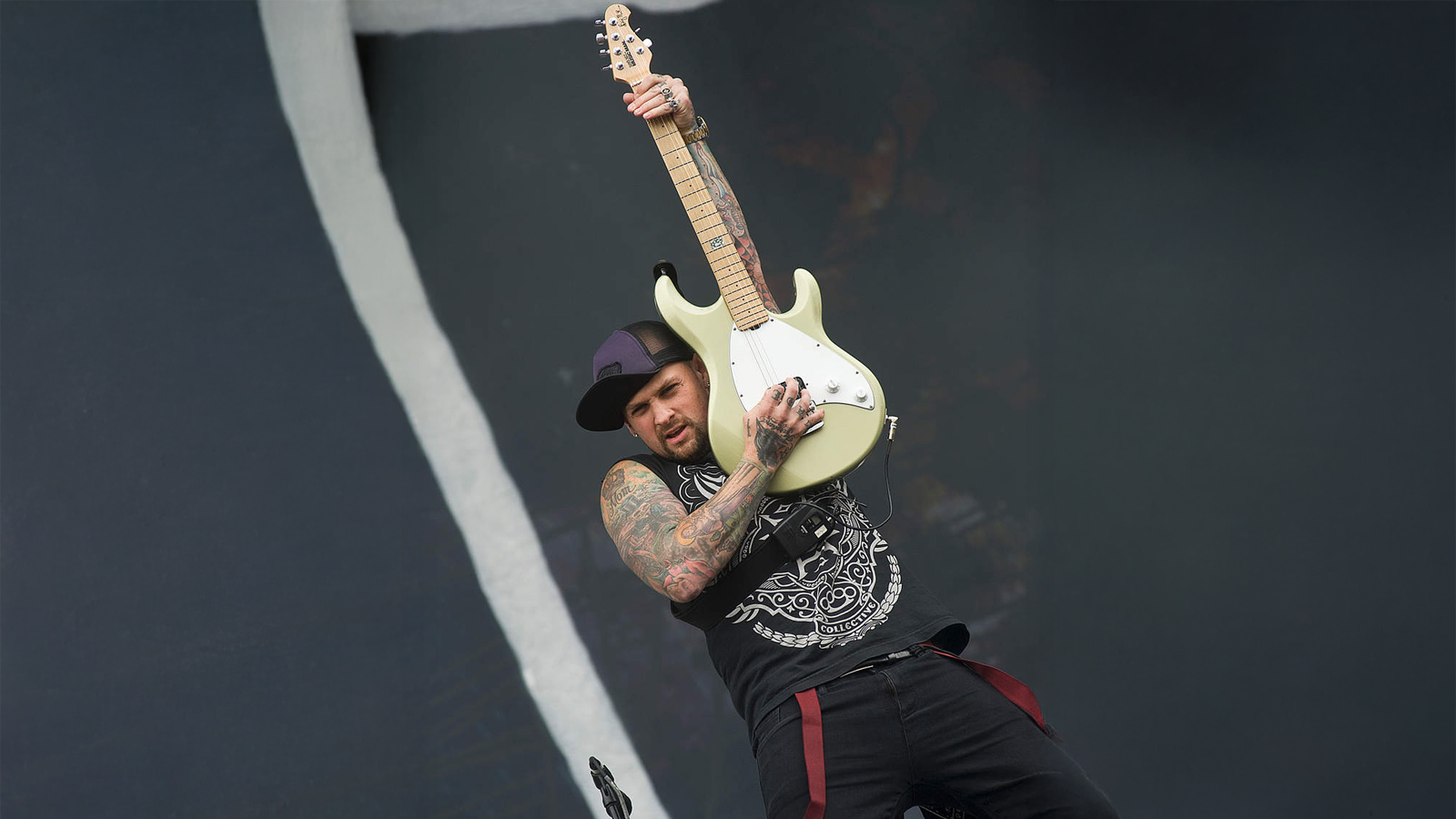 Benji Madden with his signature Music Man model in 2013