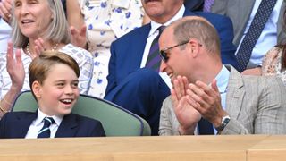 Prince George of Cambridge and Prince William, Duke of Cambridge attend The Wimbledon Men's Singles Final at All England Lawn Tennis and Croquet Club on July 10, 2022 in London, England.