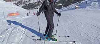 Man wearing Haglöfs Gondol Insulated Pants and jacket in the French Alps