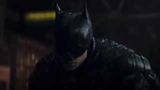 The Batman staring at the ground