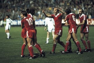 Eintracht Frankfurt players celebrate a goal against Borussia Mönchengladbach in the first leg of the 1980 UEFA Cup final.